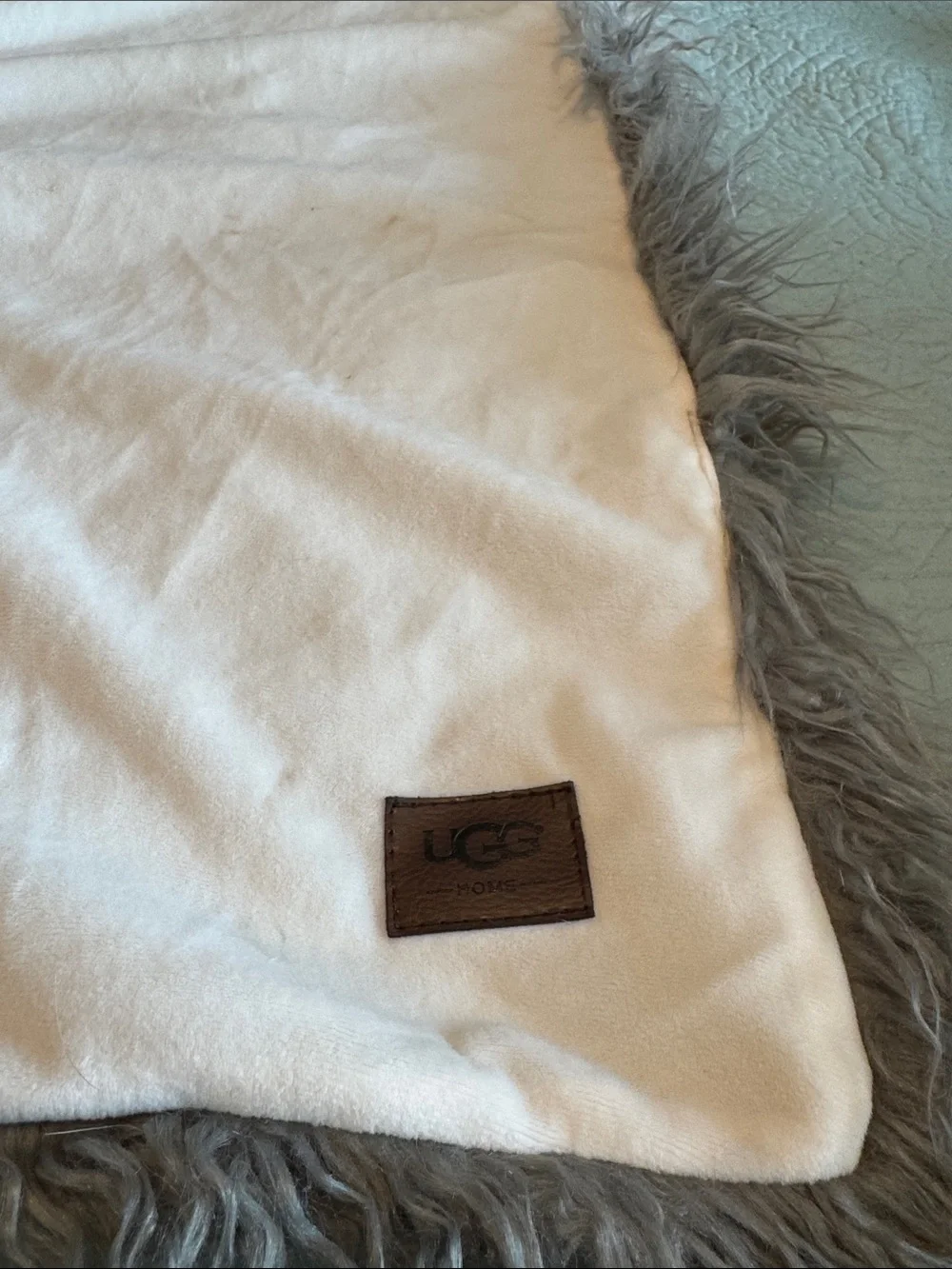 UGG Luxury Ombre Faux Fur Throw Blanket in White and Gray